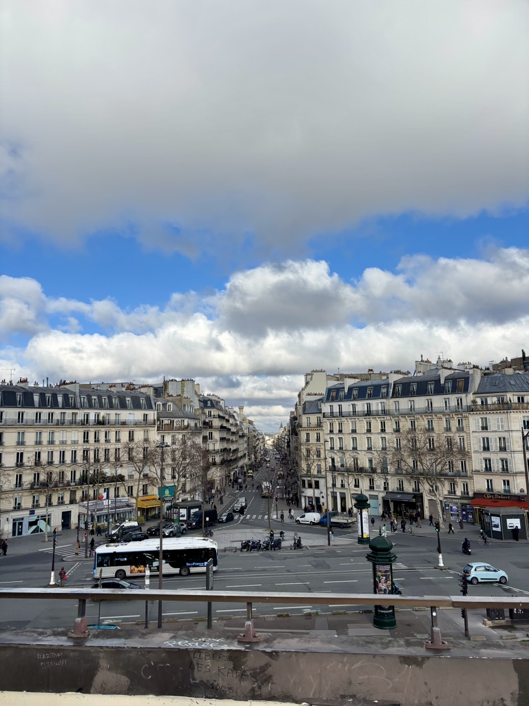 Office towers and an open lawn in La Defense in Paris on March 26, 2026