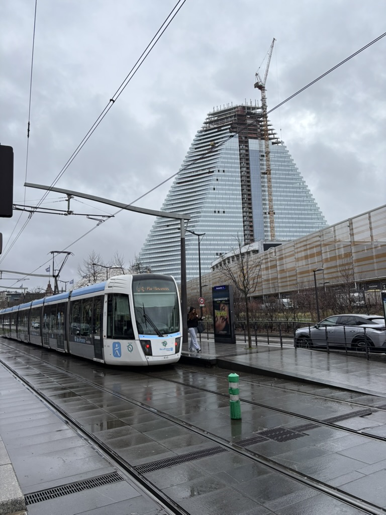 Bridge over the Seine with a Paris landmark in the background on March 26, 2026